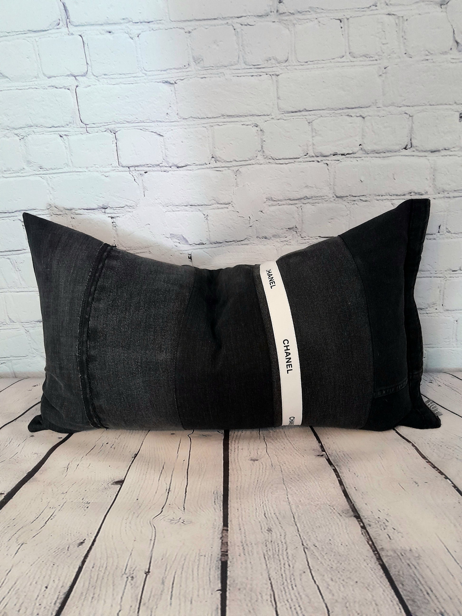 Upcycled home decor, black denim and white Chanel ribbon bolster cushion throw pillow.