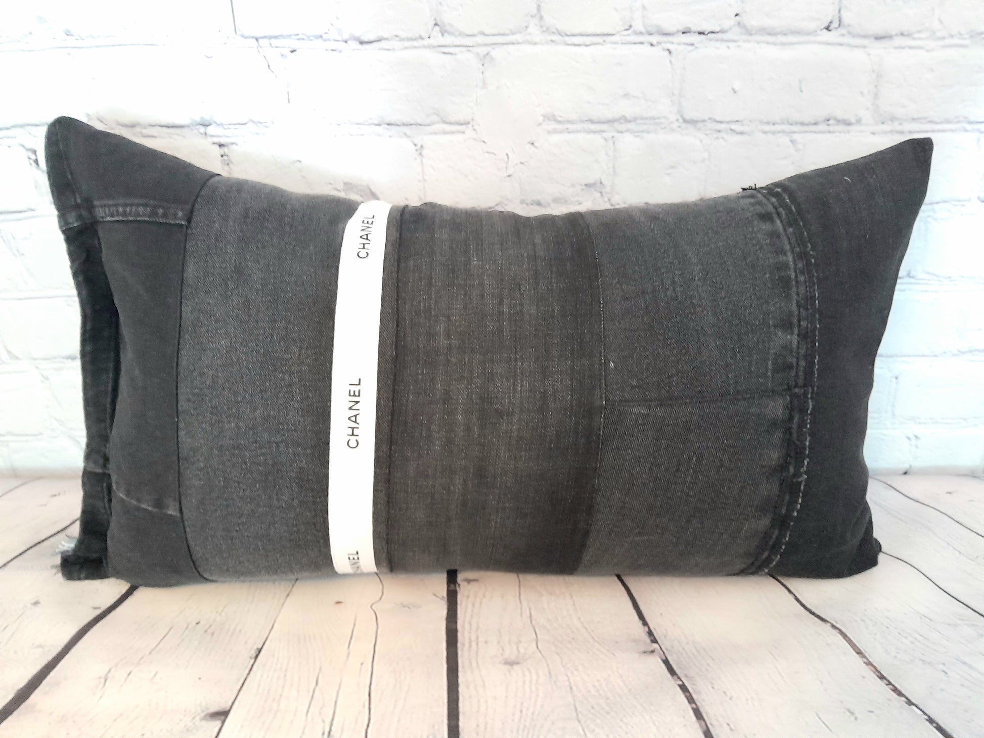 Vintage denim saved from going into landfill upcycled into unique patchwork denim bolster cushion pillows.  Black and white.