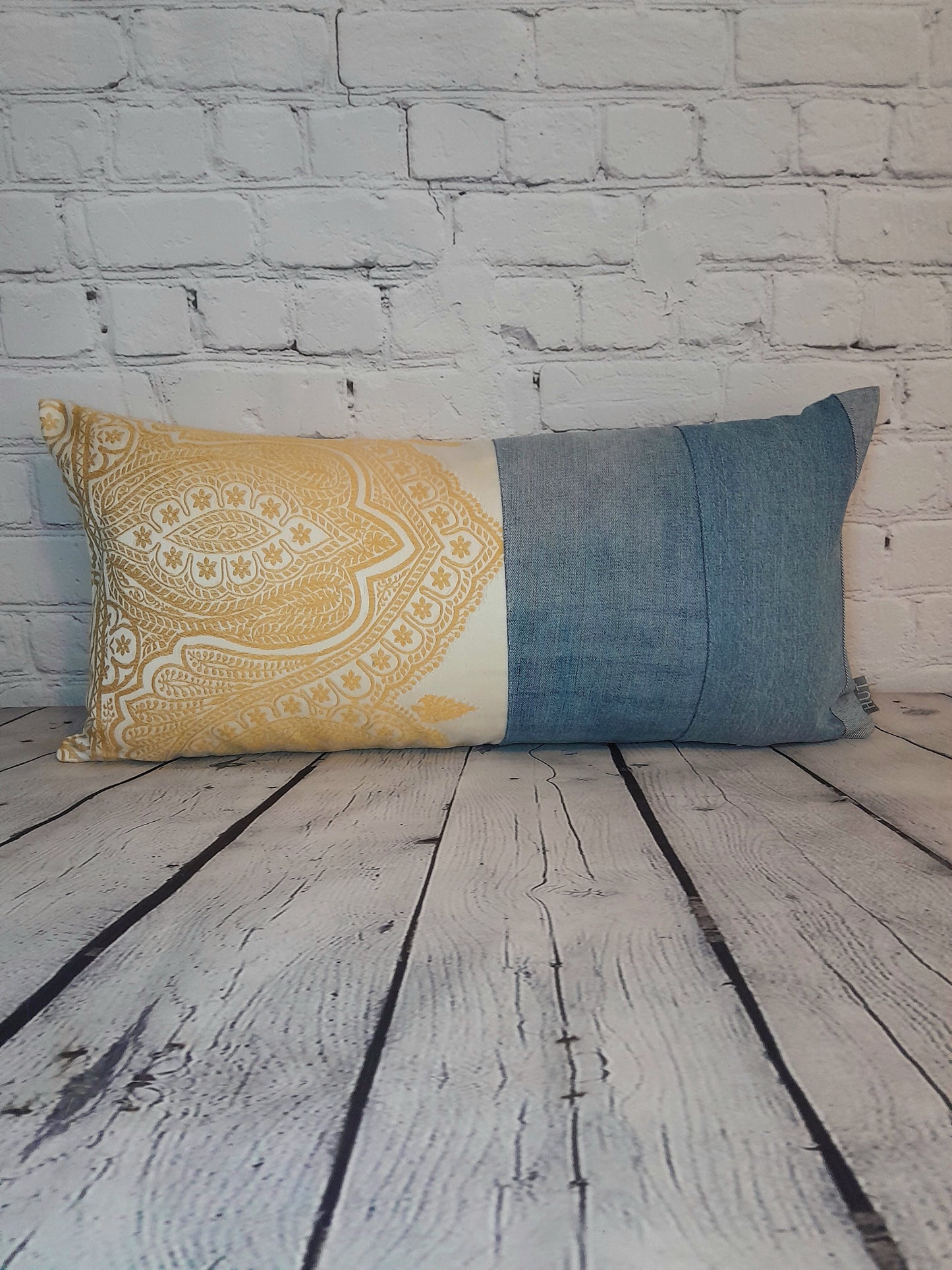 Yellow and cream embroidered cushion with repurposed pale blue denim.  Upcycled luxe homeware.