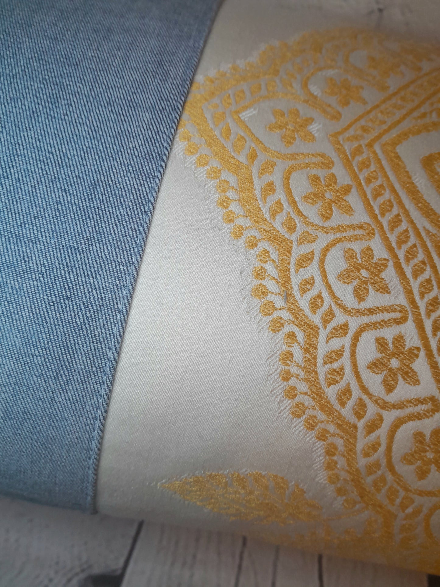 repurposed denim jeans and yellow embroidered bolster cushion cover