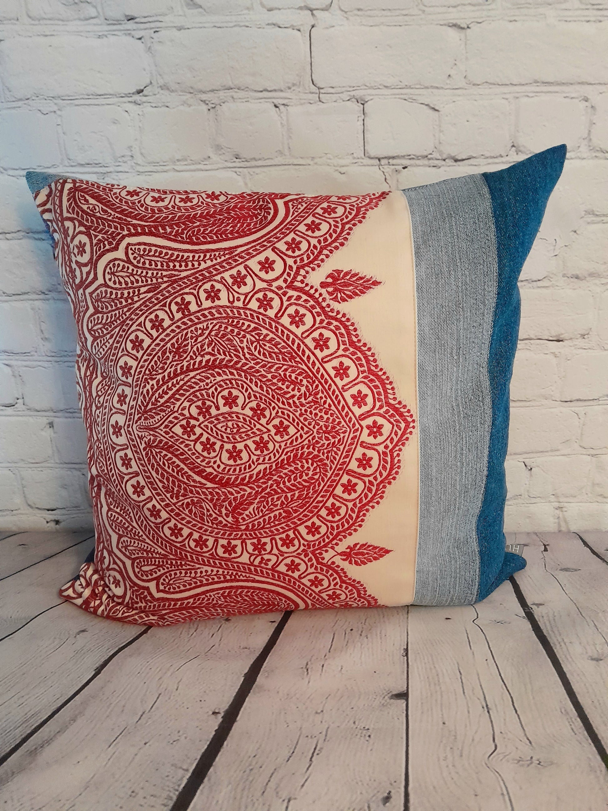 upcycled denim cushion with boho embroidery red cream blue