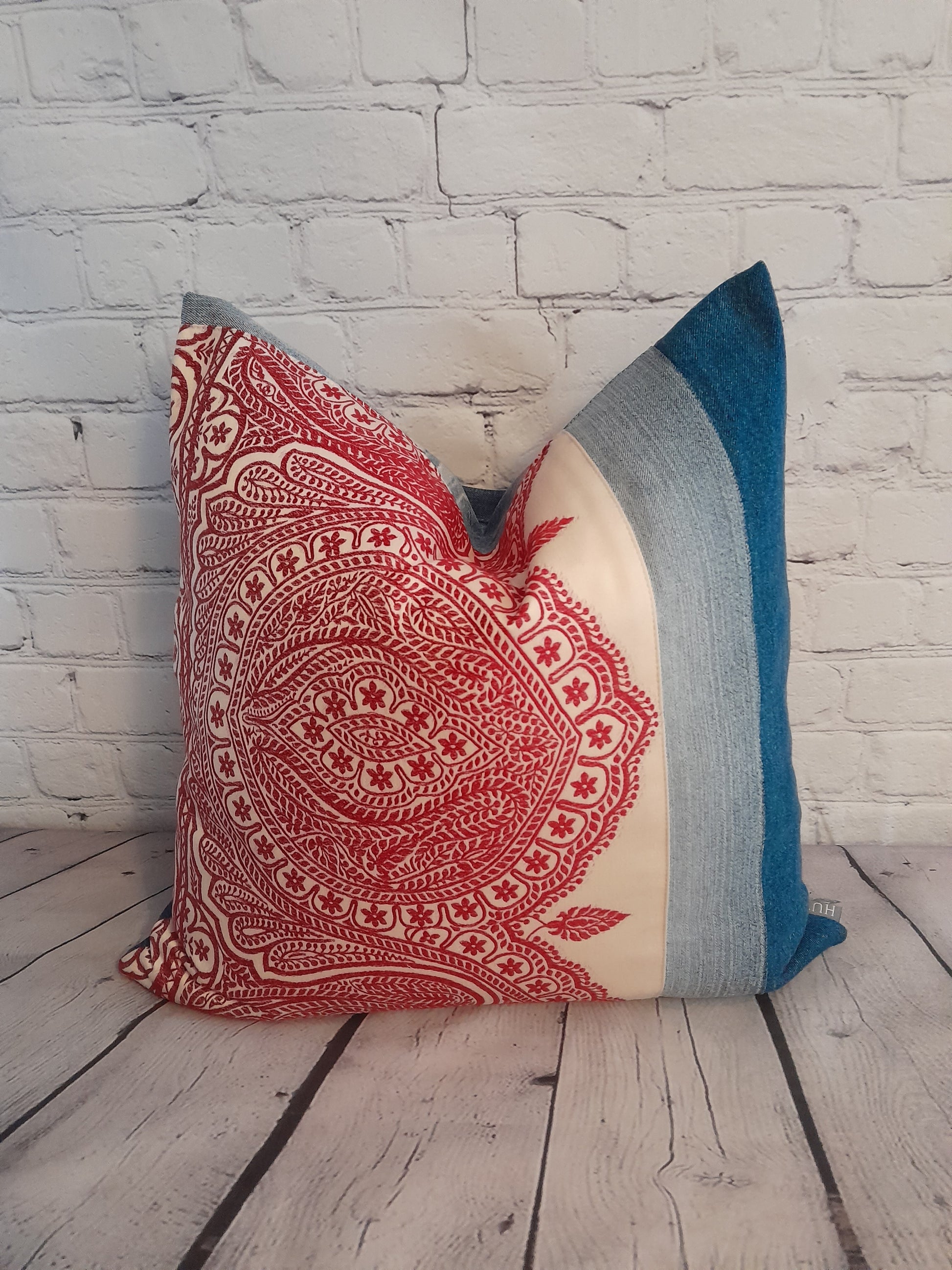 Repurposed denim cushion with boho red embroidered fabric