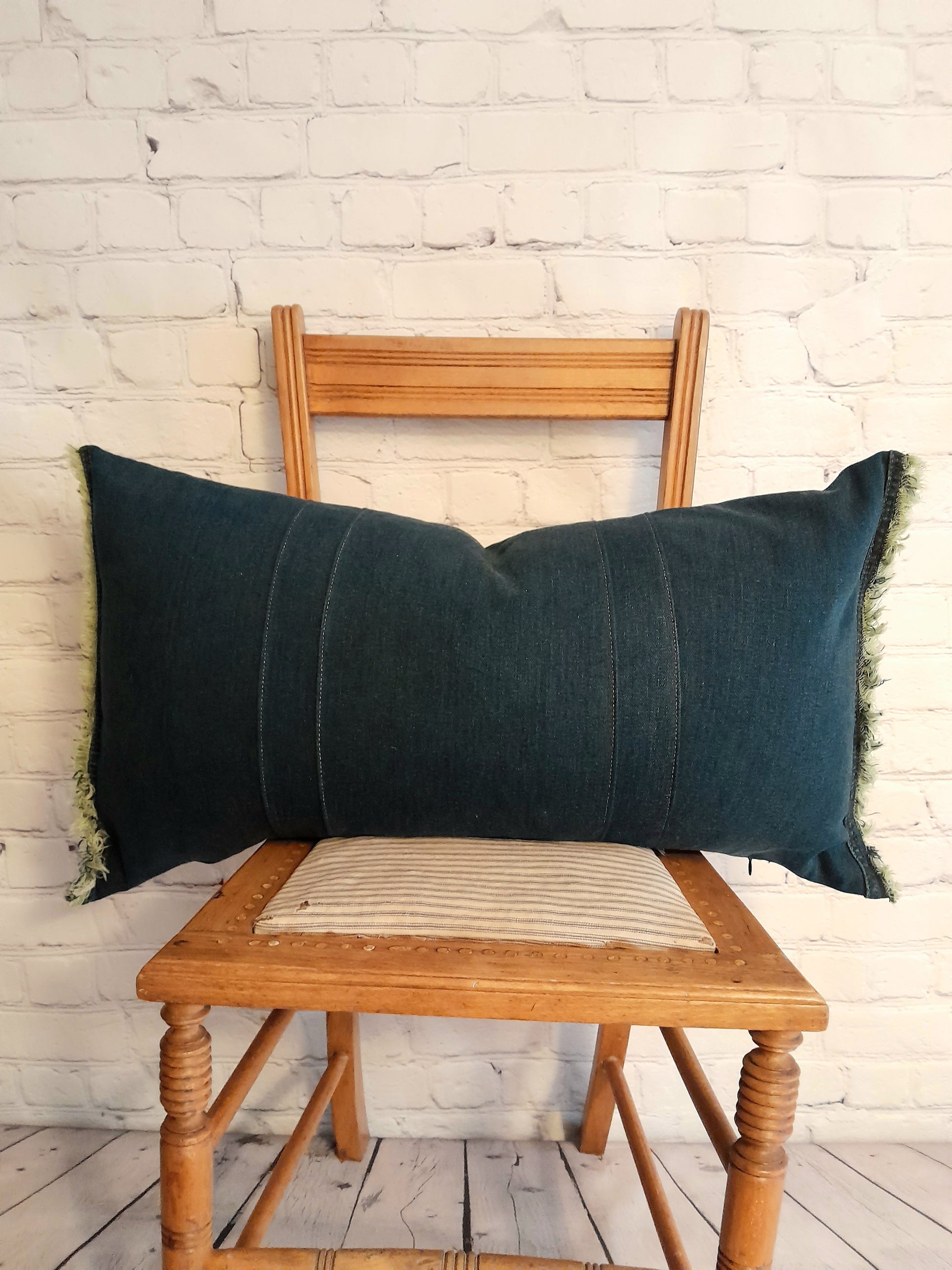 repurposed denim cushion, sustainable fashion.