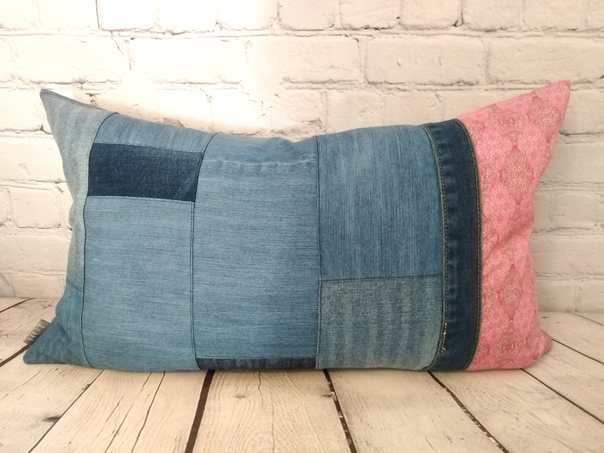 Pink and blue boho handmade bolster cushion.